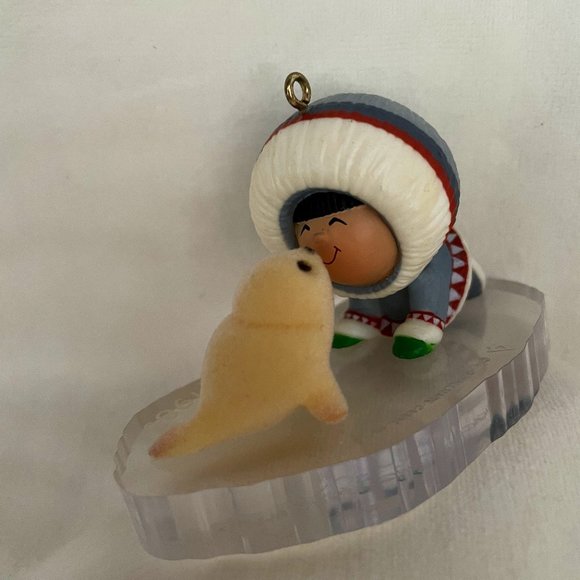 Frosty Friends - Eskimo with baby seal Hallmark Ornament.